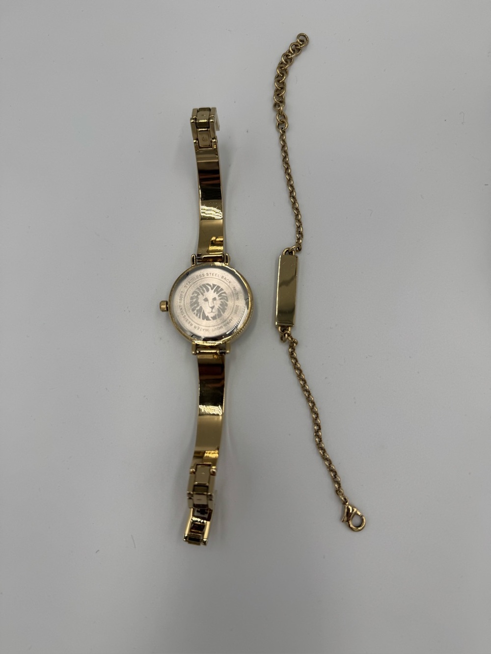 Anne Klein Gold-Tone Watch with Iridescent Abalone Dial and Bracelet Accent - Picture 9 of 9